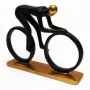 مجسم بولي أسود و ذهبي دراجة